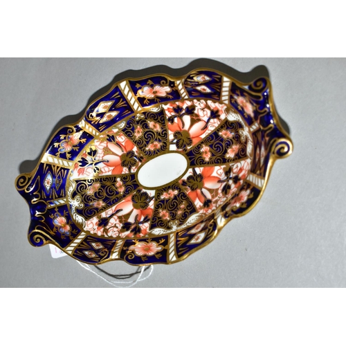 406 - A ROYAL CROWN DERBY IMARI 2451 TRINKET DISH, of scalloped oval form with scrolling handles, magenta ... 