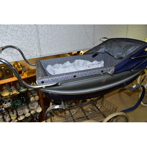 417 - TWO SILVERCROSS DOLL'S PRAMS, one lemon with pink detail and flowered decal with a matching storage ... 