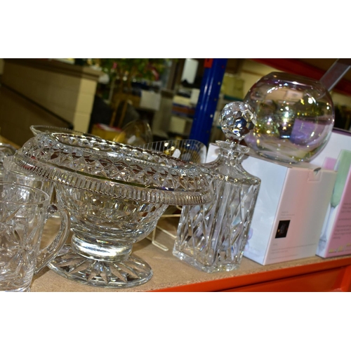 421 - A QUANTITY OF CUT CRYSTAL AND COLOURED GLASSWARE, comprising three large fruit bowls (one has nibble... 