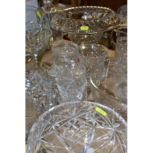 421 - A QUANTITY OF CUT CRYSTAL AND COLOURED GLASSWARE, comprising three large fruit bowls (one has nibble... 