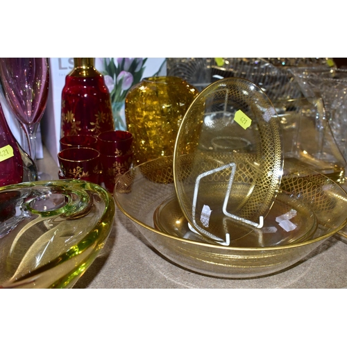 421 - A QUANTITY OF CUT CRYSTAL AND COLOURED GLASSWARE, comprising three large fruit bowls (one has nibble... 