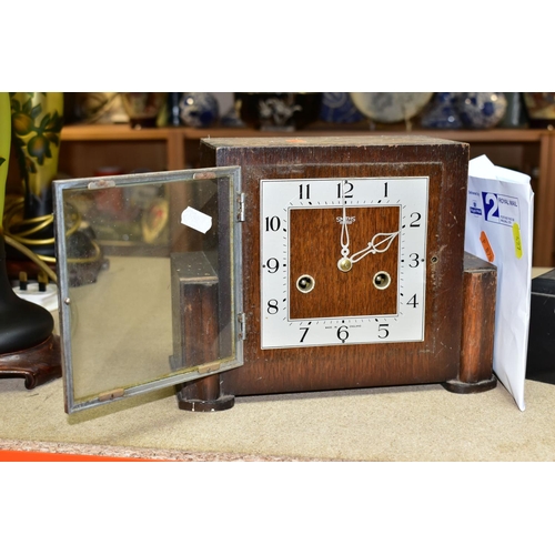 427 - TWO MANTEL CLOCKS BOTH WITH KEYS AND PENDULUMS,  comprising an Art Deco style wooden and chrome case... 