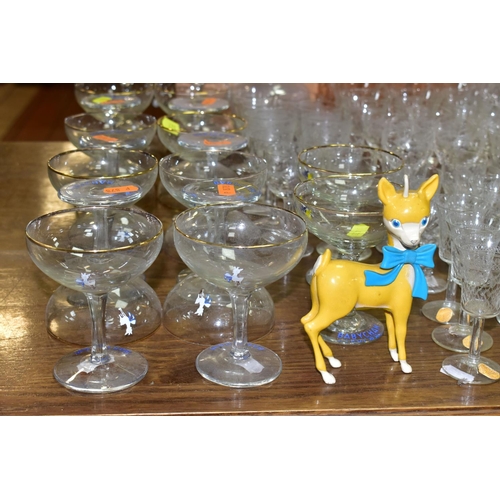 433 - A GROUP OF BABYCHAM GLASS AND CUT CRYSTAL comprising a footed cut crystal centre piece bowl, eightee... 