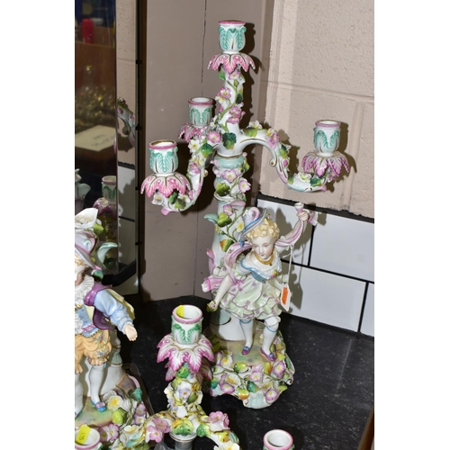 435 - TWO EARLY 20TH CENTURY FOUR LIGHT FIGURAL CANDELABRA, Continental porcelain in need of restoration, ... 