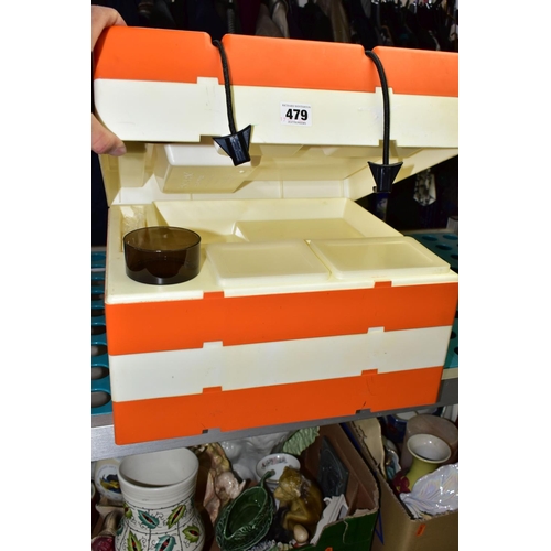 479 - A V.W  CAMPER PICNIC SET, a Pac-A-Pic Preci-Ware four person orange and white stacking picnic set, a... 