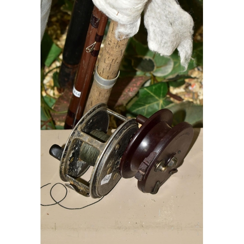 482 - A GROUP OF VINTAGE FISHING RODS AND TWO REELS, comprising a Bakelite Allcock-Aerialite reel (slight ... 