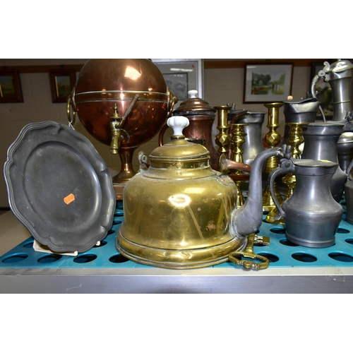 497 - A GROUP OF METALWARES, to include a copper samovar and coffee pot, pewter covered jugs with acorn fi... 