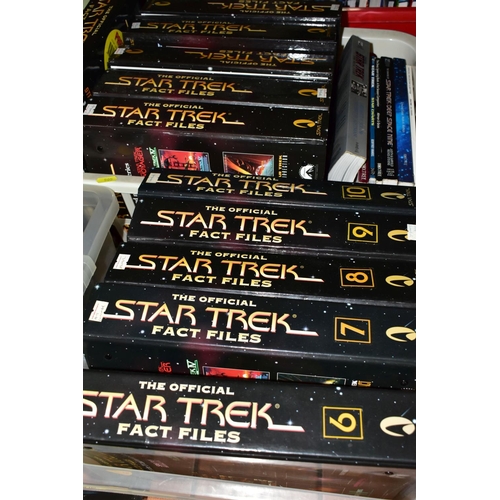 505 - A QUANTITY OF ASSORTED STAR TREK BOOKS AND MAGAZINES, to include several binders of the Official Sta... 