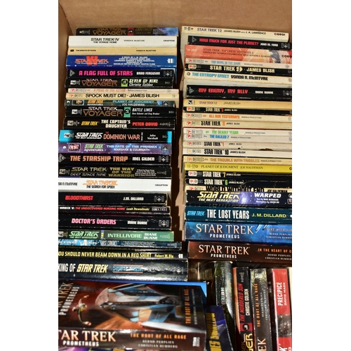 505 - A QUANTITY OF ASSORTED STAR TREK BOOKS AND MAGAZINES, to include several binders of the Official Sta... 