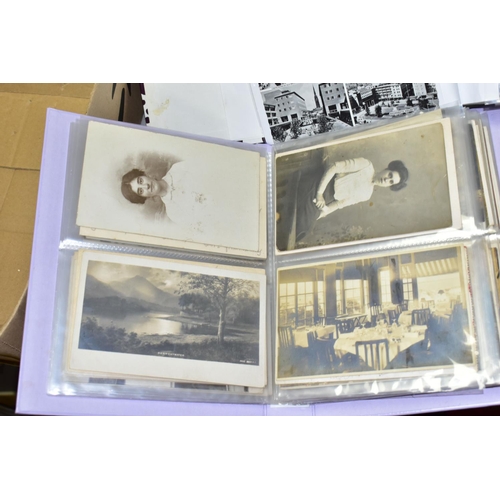 519 - POSTCARDS, three albums containing approximately 420 postcards and photographs dating from the early... 