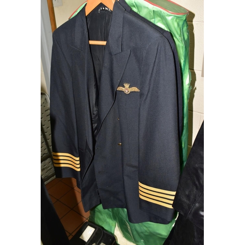 527 - A GROUP OF VINTAGE BRITISH UNIFORMS, comprising a British Airways Captain's jacket, a Captain's 'Top... 