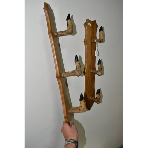 529 - A PAIR OF TAXIDERMY DEER HOOVES RACKS (formerly used to display guns) (2)