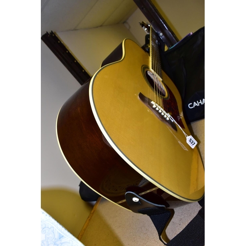 537 - AN ARIA ACOUSTIC GUITAR, MUSIC STAND AND MUSIC BOOKS, the Aria guitar, model number AW-55, with soft... 