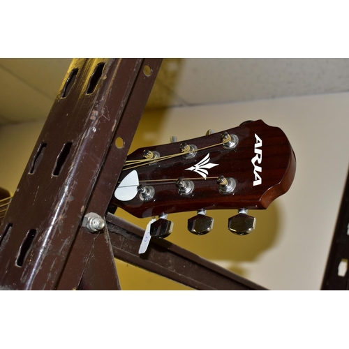 537 - AN ARIA ACOUSTIC GUITAR, MUSIC STAND AND MUSIC BOOKS, the Aria guitar, model number AW-55, with soft... 