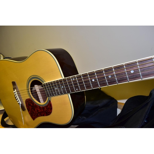 537 - AN ARIA ACOUSTIC GUITAR, MUSIC STAND AND MUSIC BOOKS, the Aria guitar, model number AW-55, with soft... 