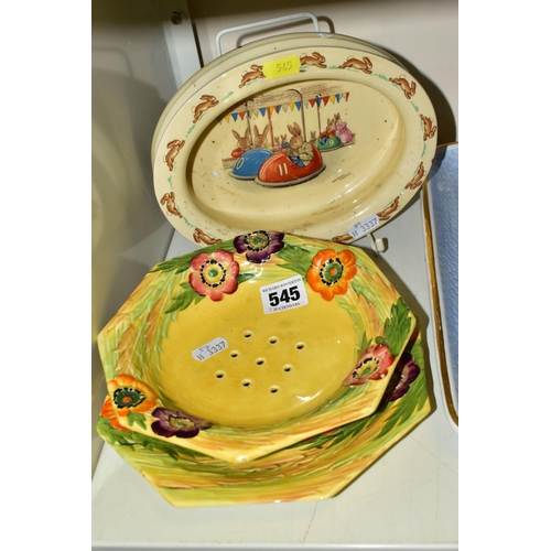 545 - A CARLTON WARE STRAWBERRY DISH AND STAND, together with a Royal Doulton 'Bunnykins' oval dish, decor... 