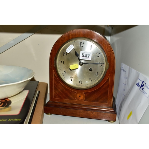 547 - A JUNGHANS MAHOGANY MANTLE CLOCK, runs briefly, chimes ok, with key and pendulum, together with a bo... 