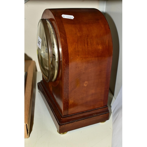 547 - A JUNGHANS MAHOGANY MANTLE CLOCK, runs briefly, chimes ok, with key and pendulum, together with a bo... 