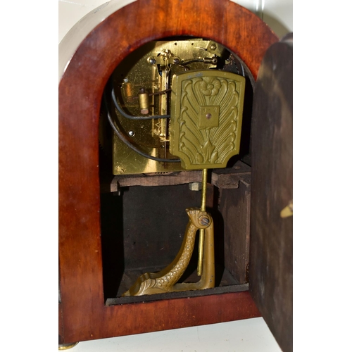 547 - A JUNGHANS MAHOGANY MANTLE CLOCK, runs briefly, chimes ok, with key and pendulum, together with a bo... 