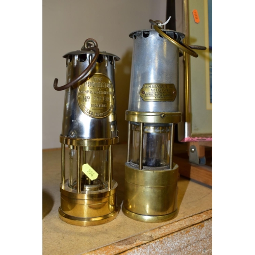 554 - THREE BRASS AND IRON MINER'S LAMPS, The Protector Lamp & Lighting Co. Ltd No. Type 1A lamp, a J.H Na... 