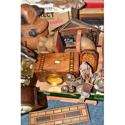 559 - THREE BOXES OF TREEN AND HOUSEHOLD SUNDRIES, to include hand carved wooden pig bookends, a group of ... 