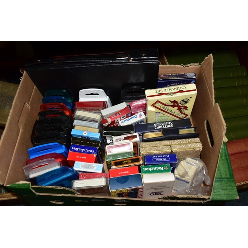 567 - THREE BOXES OF BOOKS AND PLAYING CARDS, TOGETHER WITH TWO SUITCASES, to include approximately twenty... 