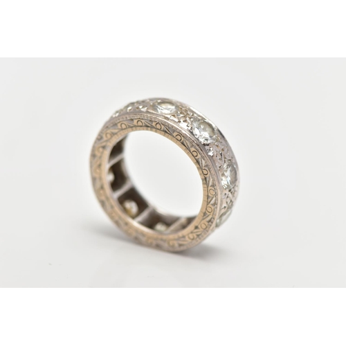 110 - A WHITE METAL DIAMOND FULL ETERNITY RING, comprising a series of brilliant cut diamonds with texture... 