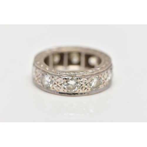 110 - A WHITE METAL DIAMOND FULL ETERNITY RING, comprising a series of brilliant cut diamonds with texture... 