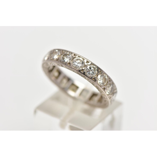 111 - A DIAMOND ETERNITY BAND RING, a full eternity ring set with nineteen round brilliant cut diamonds, a... 