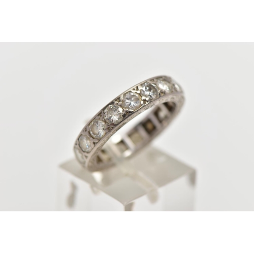 111 - A DIAMOND ETERNITY BAND RING, a full eternity ring set with nineteen round brilliant cut diamonds, a... 