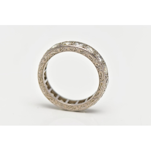 111 - A DIAMOND ETERNITY BAND RING, a full eternity ring set with nineteen round brilliant cut diamonds, a... 