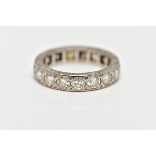 111 - A DIAMOND ETERNITY BAND RING, a full eternity ring set with nineteen round brilliant cut diamonds, a... 