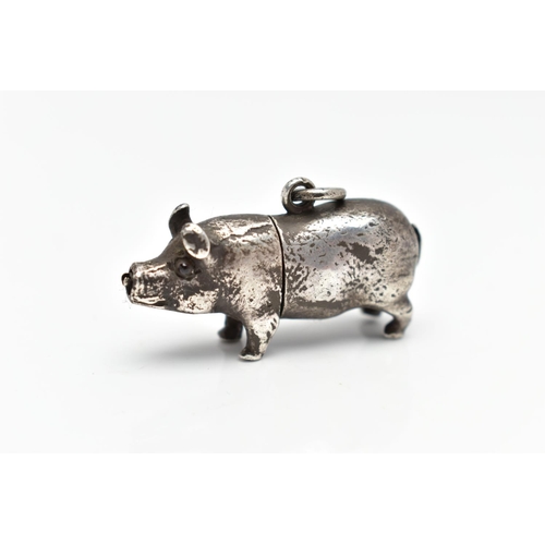 16 - A MINIATURE WHITE METAL NOVELTY PENCIL, in the form of a small pig, integrated pencil holder, fitted... 