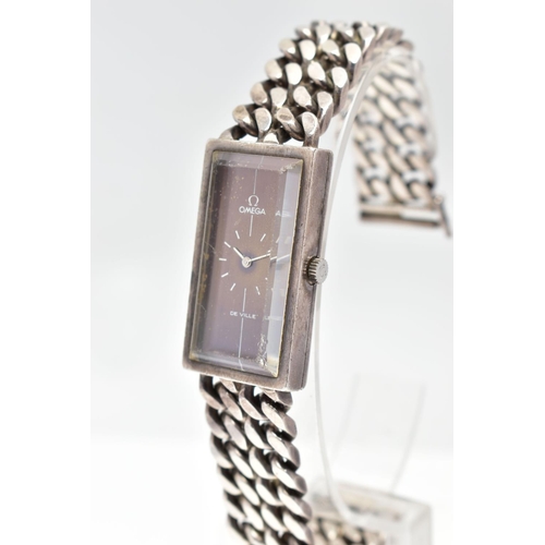 18 - A SILVER OMEGA DE VILLE WRISTWATCH, the rectangular blue dial signed 'Omega De Ville', with baton ho... 