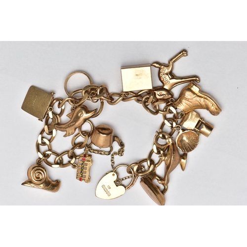 2 - A 9CT GOLD CHARM BRACELET, a flat curb link bracelet, fitted with a heart padlock clasp, hallmarked ... 