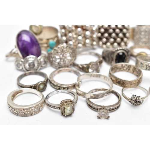 34 - AN ASSORTMENT OF SILVER AND WHITE METAL RINGS, to include a large keepers ring, hallmarked 925 Sheff... 