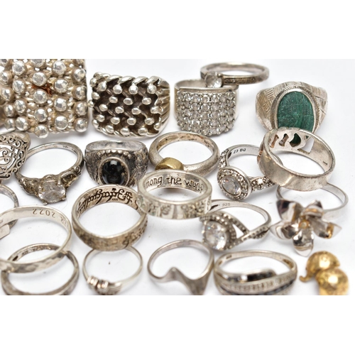 34 - AN ASSORTMENT OF SILVER AND WHITE METAL RINGS, to include a large keepers ring, hallmarked 925 Sheff... 