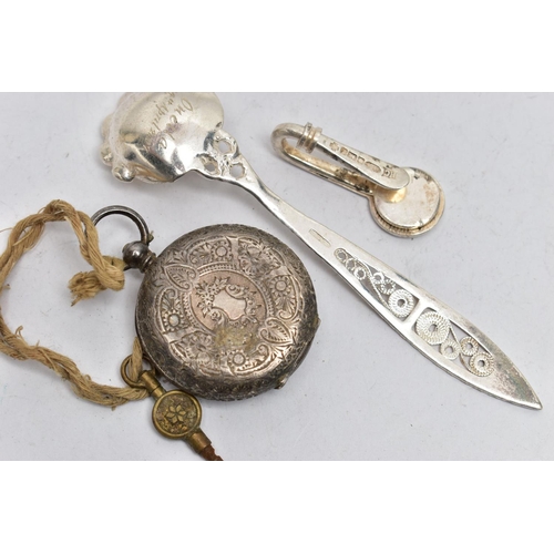 46 - A SILVER NAPKIN CLIP, POCKET WATCH AND SPOON, the first a silver napkin clip, hallmarked 'Hugh Craws... 