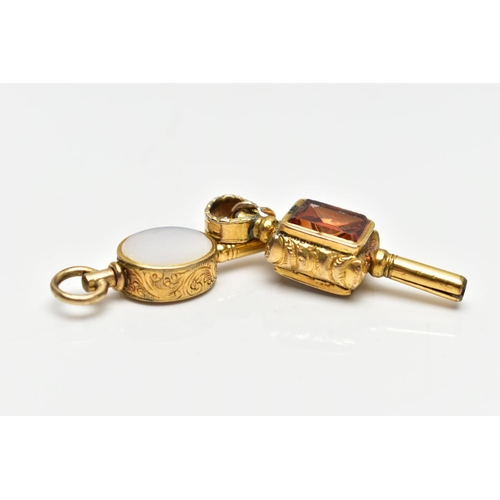 51 - TWO WATCH KEYS, the first a yellow metal key set with an oval citrine and chalcedony panels, floral ... 