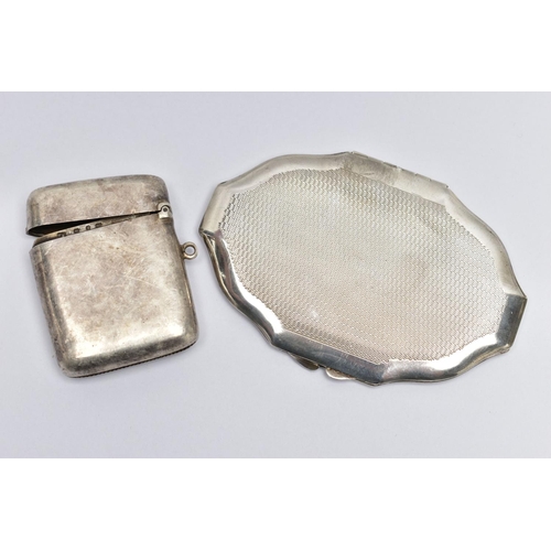 55 - A SILVER VESTA CASE AND A COMPACT, the vesta of a rounded rectangular form, polished design with eng... 