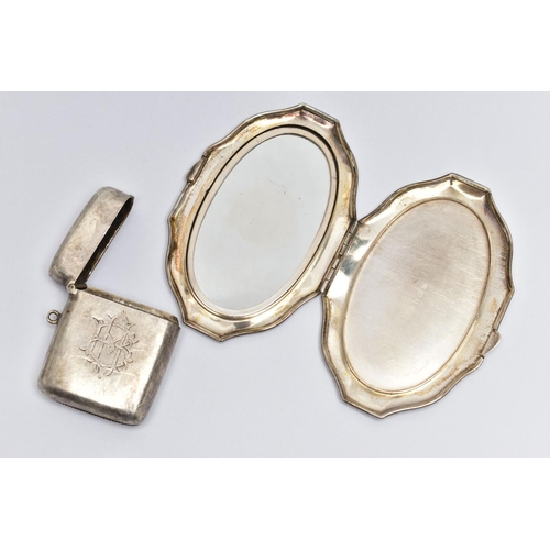 55 - A SILVER VESTA CASE AND A COMPACT, the vesta of a rounded rectangular form, polished design with eng... 