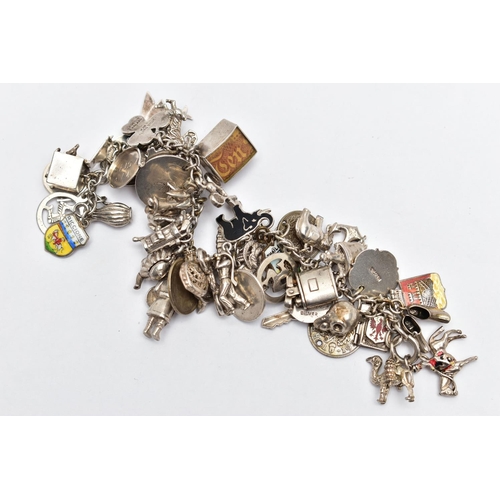 70 - A WHITE METAL CHARM BRACELET, curb link chain fitted with fifty-two charms in form such as a teapot,... 