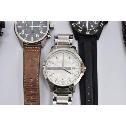 80 - A COLLECTION OF FIVE FASHION WATCHES, to include an 'Armani Exchange' wristwatch, on stainless steel... 