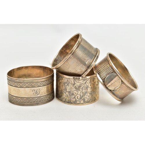 82 - A SELECTION OF FOUR SILVER NAPKIN RINGS, to include an early 20th century Charles Horner napkin ring... 