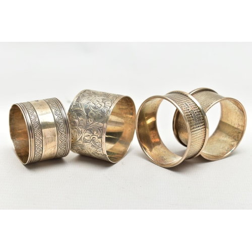 82 - A SELECTION OF FOUR SILVER NAPKIN RINGS, to include an early 20th century Charles Horner napkin ring... 