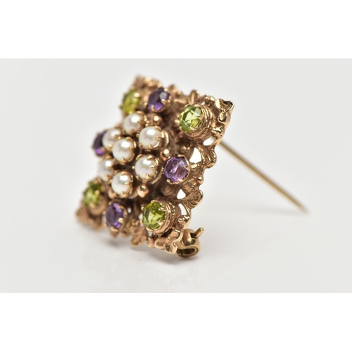 9 - A 9CT GOLD PERIDOT, AMETHYST AND SPLIT PEARL BROOCH, of openwork floral design, the center set with ... 