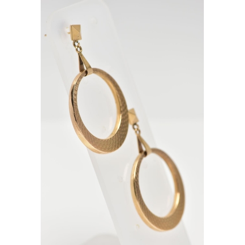 101 - A PAIR OF 9CT YELLOW GOLD HOOP EARRINGS, each suspending an engine turned pattern hoop, hallmarked 9... 