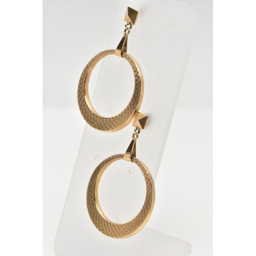 101 - A PAIR OF 9CT YELLOW GOLD HOOP EARRINGS, each suspending an engine turned pattern hoop, hallmarked 9... 