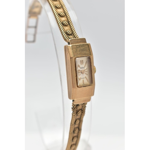 107 - A 9CT GOLD WRISTWATCH, hand wound movement, rectangular dial signed 'Trebex' Incabloc, baton markers... 