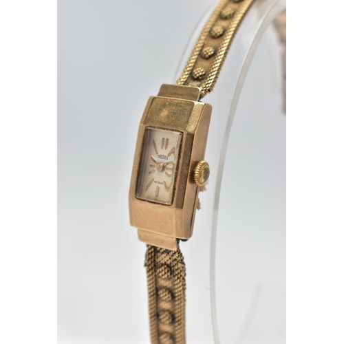 107 - A 9CT GOLD WRISTWATCH, hand wound movement, rectangular dial signed 'Trebex' Incabloc, baton markers... 